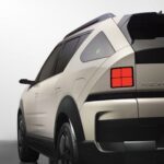 Detailed rear view of the Hyundai Nexo FCEV captured in a modern studio setting.